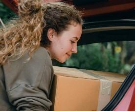 woman packing boxes
