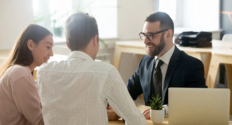 Young couple meeting with finance advisor