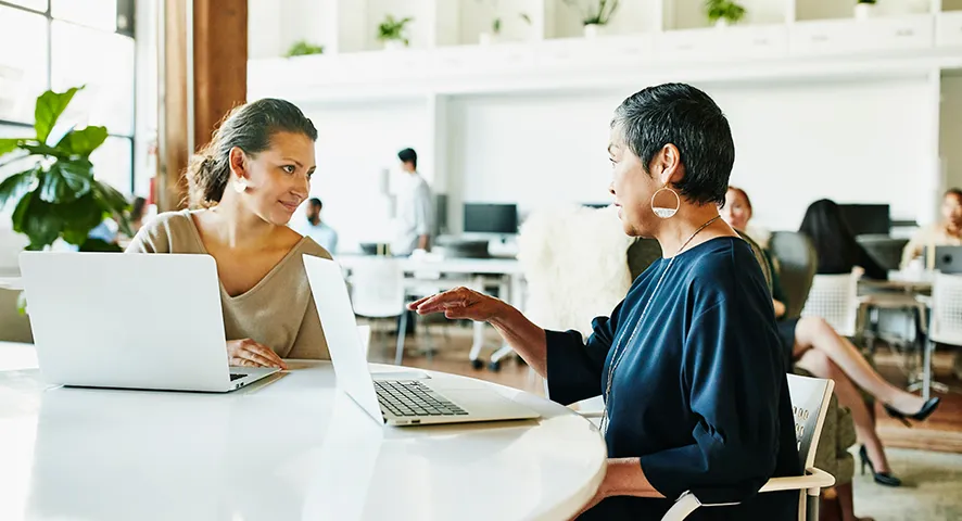 Two women having a meeting together at work