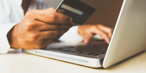 man paying for something on computer